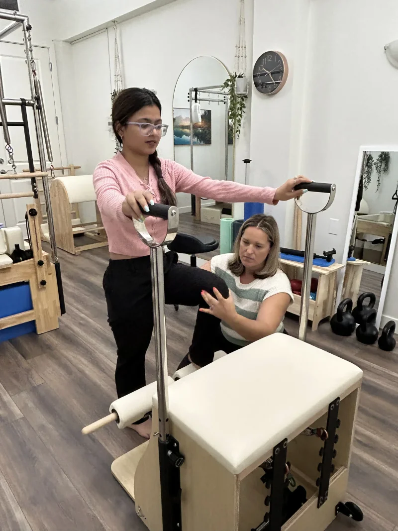 Clinical Pilates session with physiotherapist guidance at At Ease Physio in South Surrey