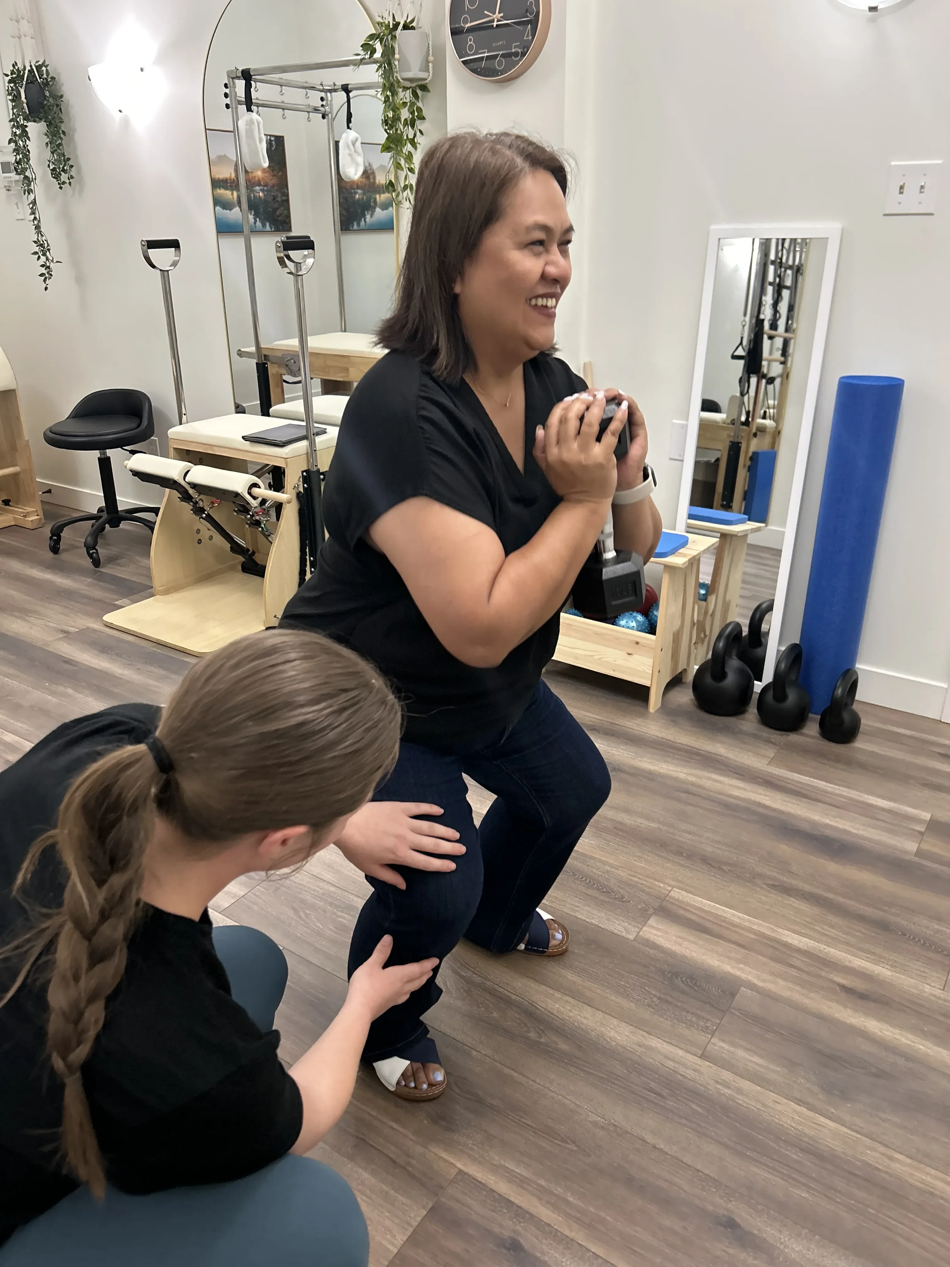 Kinesiologist guiding patient through active rehabilitation exercises at At Ease Physio in South Surrey